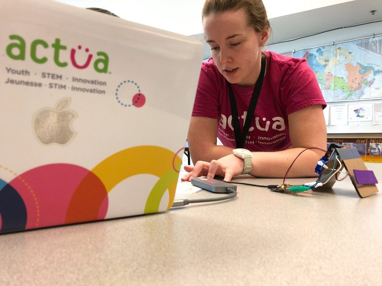 Young girl participating in STEM event.